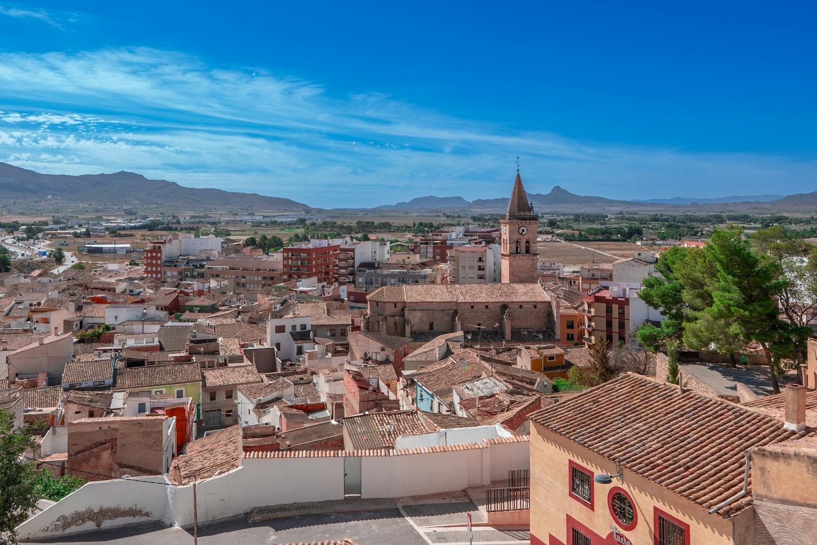 Stunning aerial view of Villena, Spain's historic center with scenic landscapes and traditional architecture.